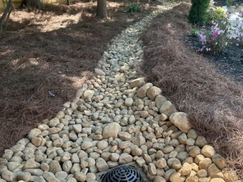 Example of grass drainage in GA done by Catalan Landscaping for specific service page 