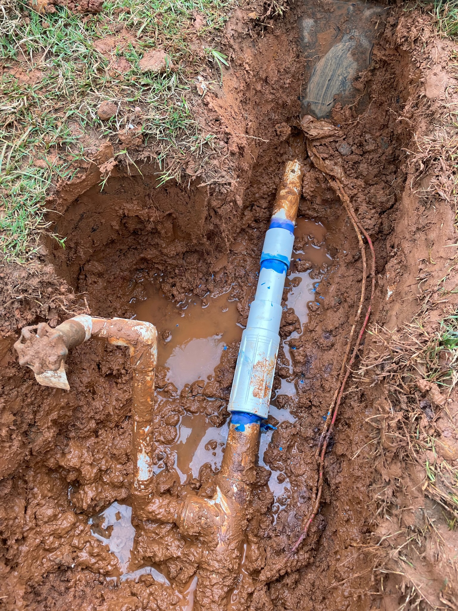this shows the fitting of an irrigation system in atlanta by catalan landscaping