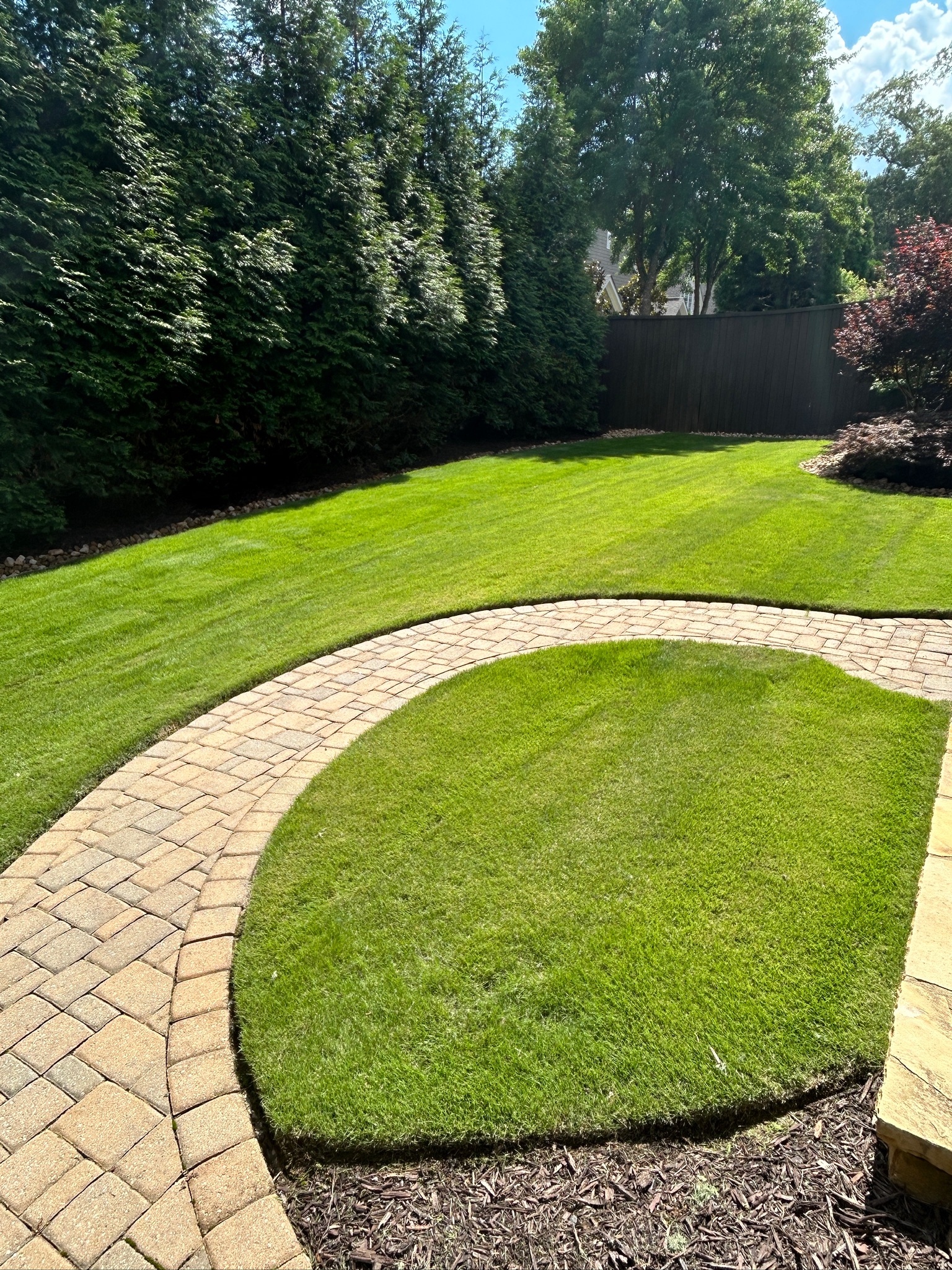 Example of trimming a lawn in GA done by Catalan Landscaping for specific service page
